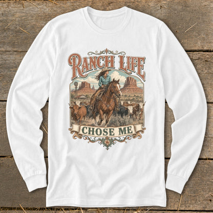 Ranch life with woman on horse, cattle, windmill, and mountains.
