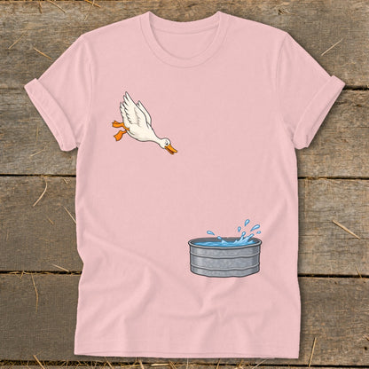 Pink t-shirt with cartoon duck jumping into a galvanized tub of water.
