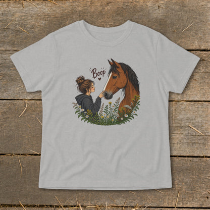 Illustration of a girl touching a horse's nose with "Boop" text above.