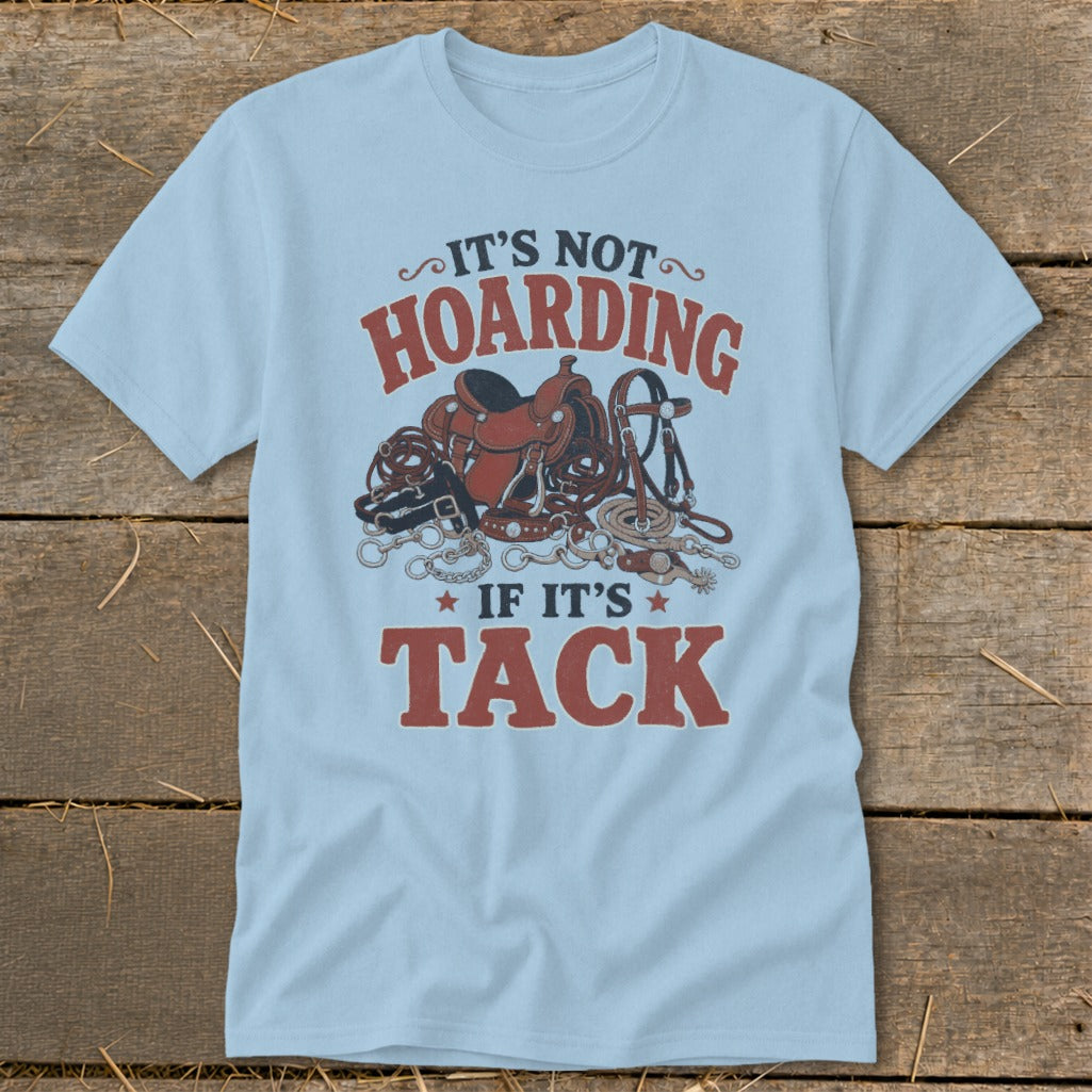 Light blue t-shirt with "It's Not Hoarding If It's Tack" and equestrian gear graphic.