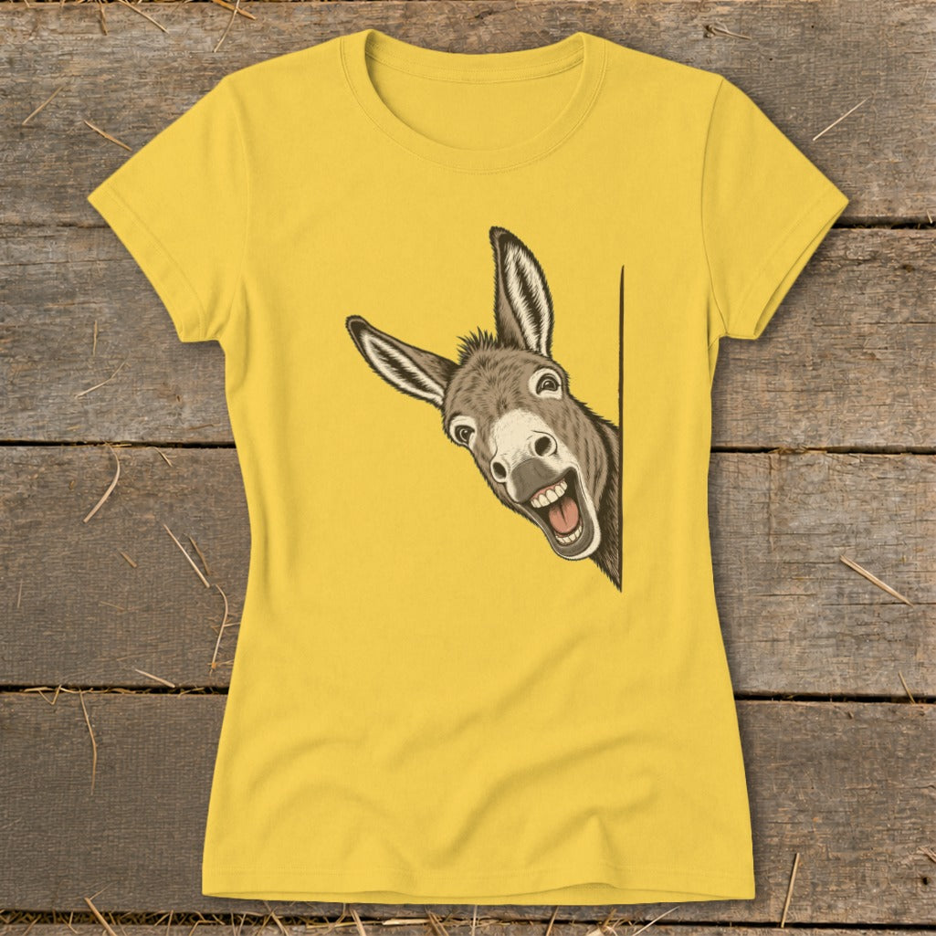 Yellow t-shirt with a cartoon donkey peeking out from the side.