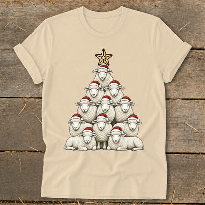 Sheep Christmas tree with Santa hats and a star topper on a tan t-shirt.