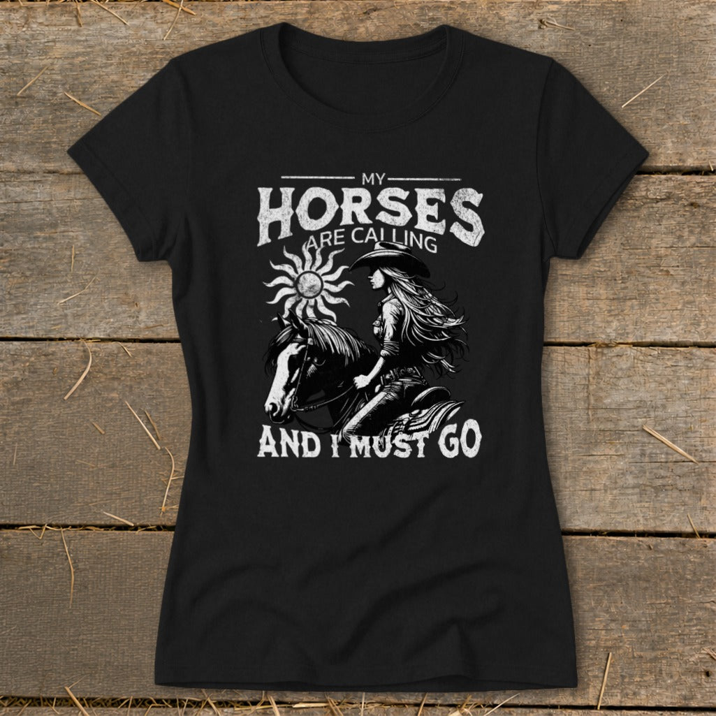 Black t-shirt with "My Horses Are Calling and I Must Go" text and illustration.