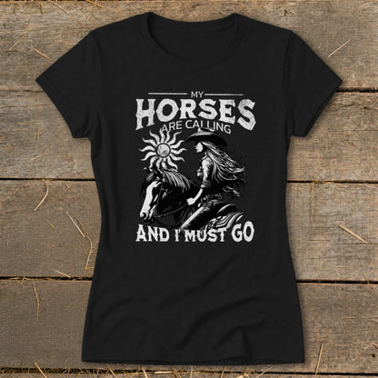 Black t-shirt with "My Horses Are Calling and I Must Go" text and illustration.