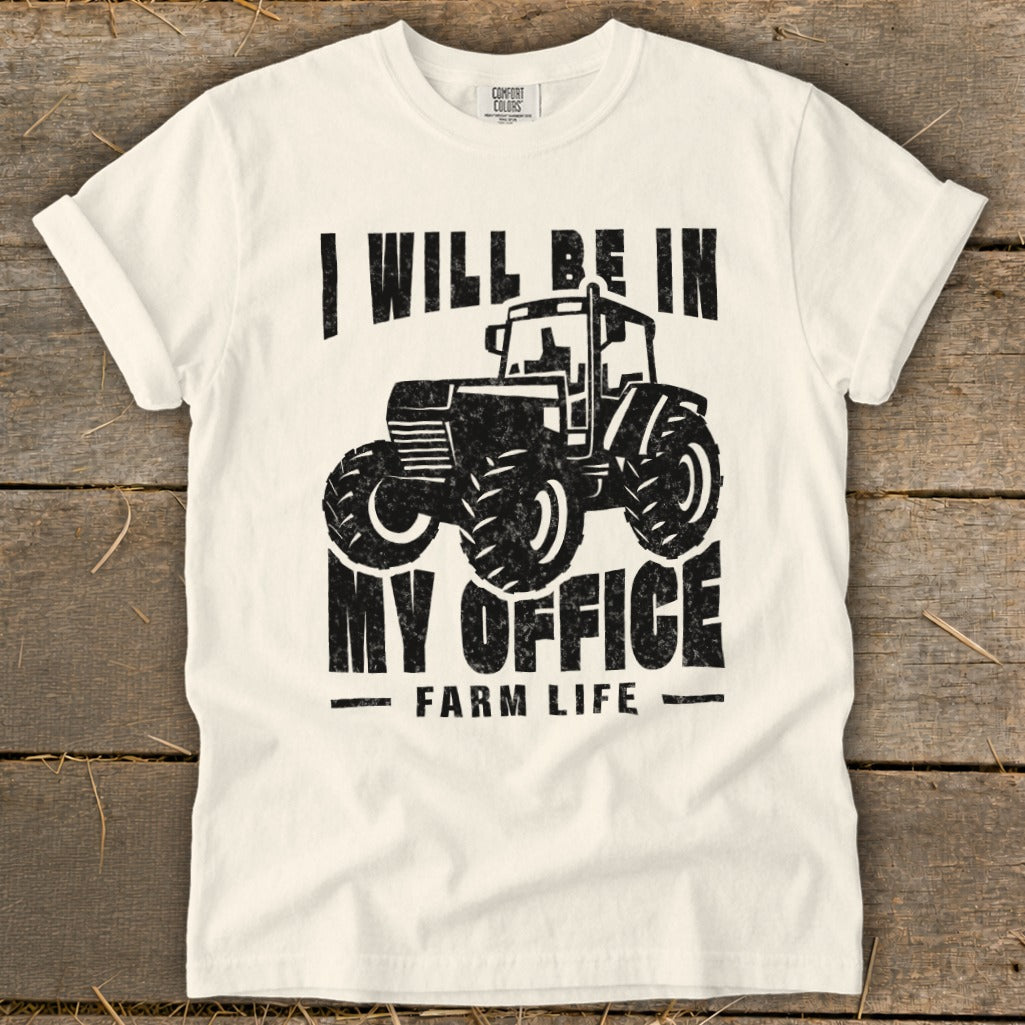 White t-shirt with black graphic of a tractor and text "I WILL BE IN MY OFFICE FARM LIFE".