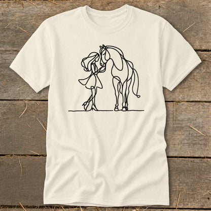 Line art of a girl and horse on a cream t-shirt.