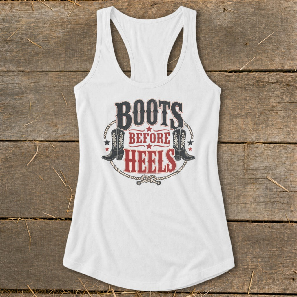 White tank top with "Boots Before Heels" graphic featuring cowboy boots.