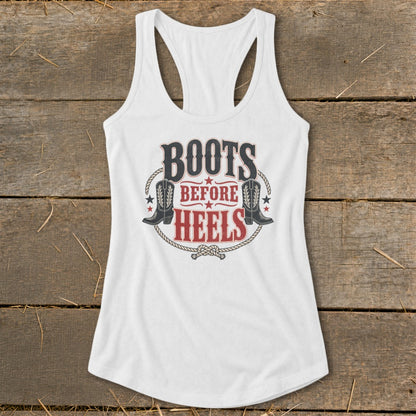 White tank top with "Boots Before Heels" graphic featuring cowboy boots.