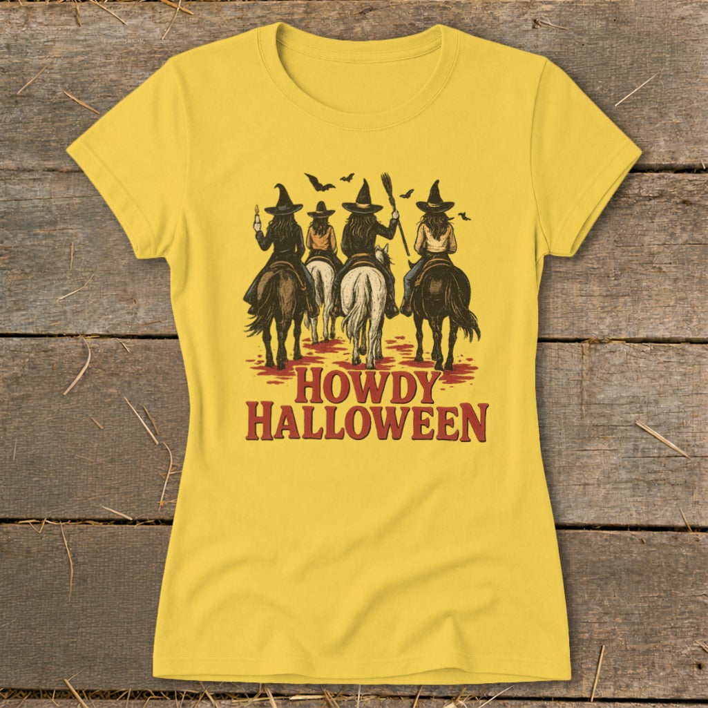 Yellow t-shirt with "Howdy Halloween" text and witches on horseback illustration.