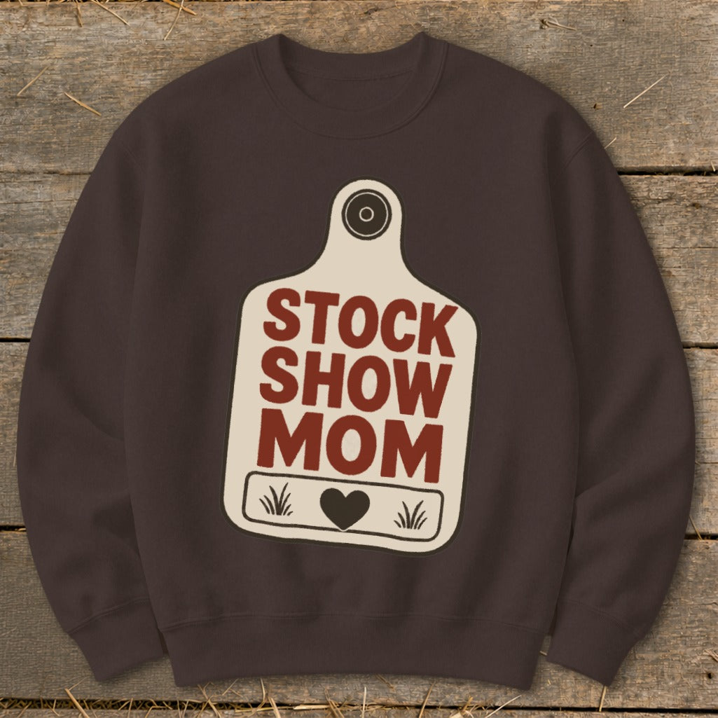Brown crewneck sweatshirt with a cream tag graphic saying "STOCK SHOW MOM".