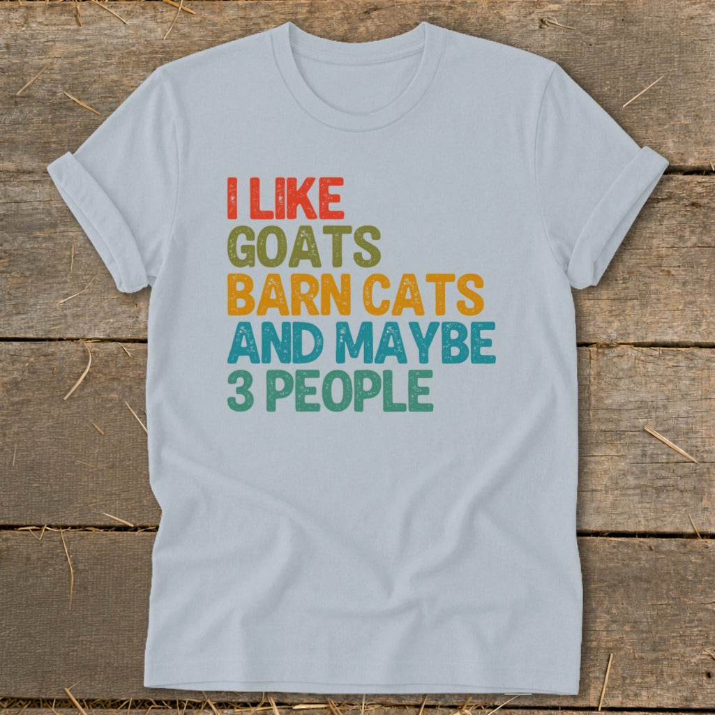 Light blue t-shirt with text "I like goats barn cats and maybe 3 people."