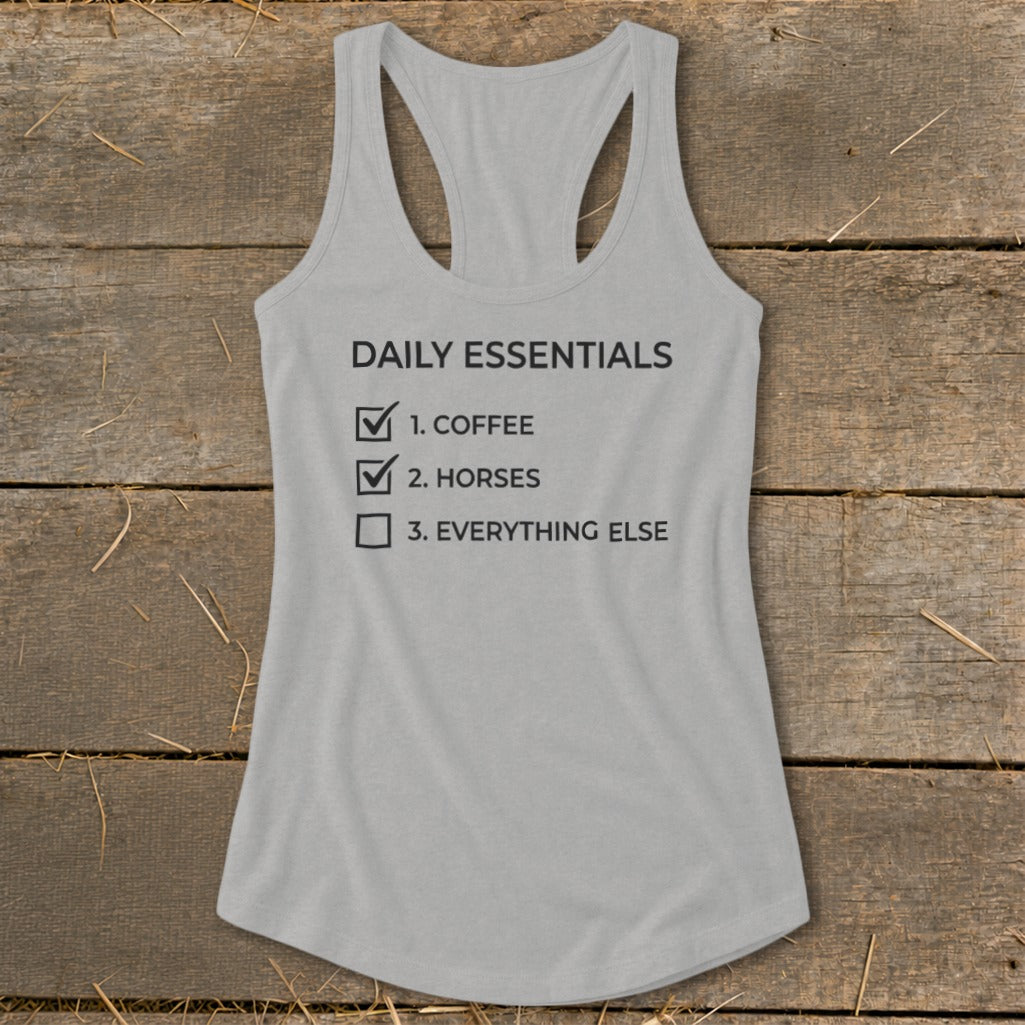 Grey tank top with "Daily Essentials" checklist including coffee, horses, and everything else.