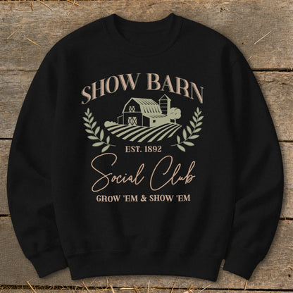 Black sweatshirt with "Show Barn Social Club" graphic and farm imagery.