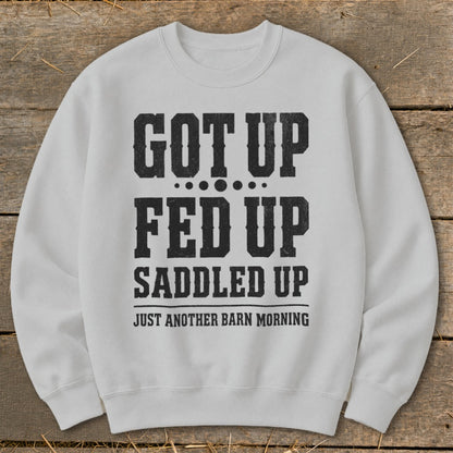 Light gray sweatshirt with black text: GOT UP FED UP SADDLED UP JUST ANOTHER BARN MORNING
