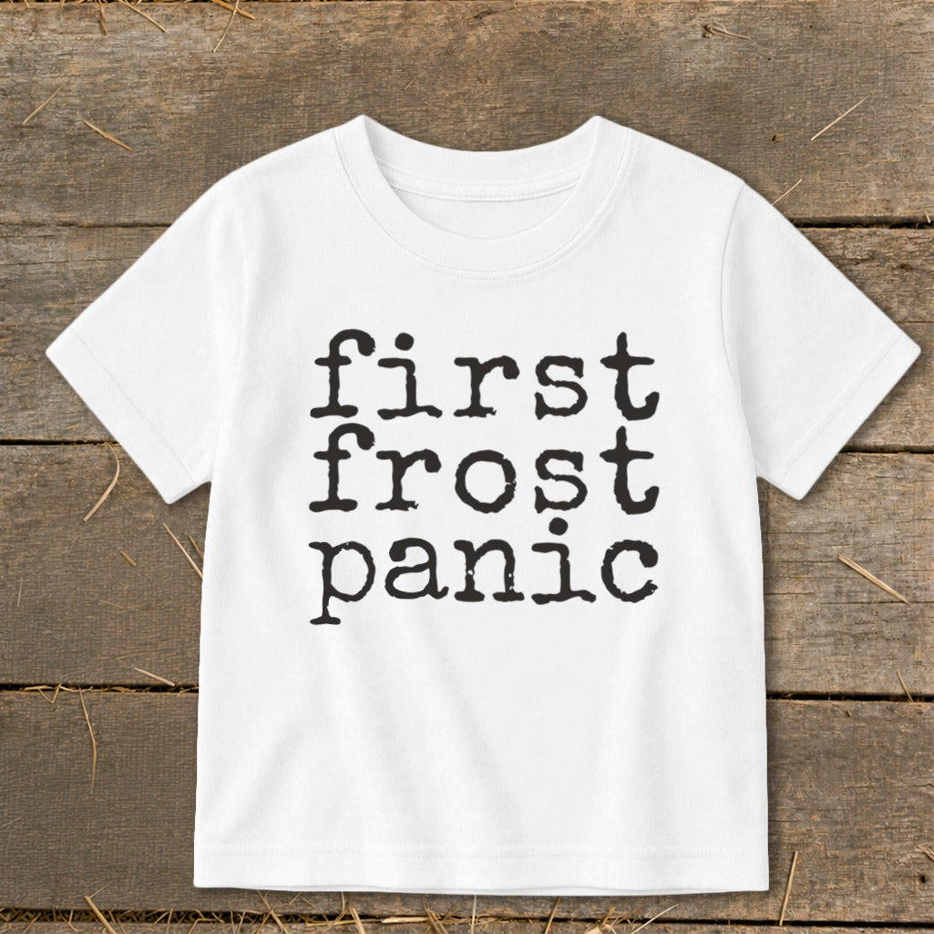 White t-shirt with black text "first frost panic"