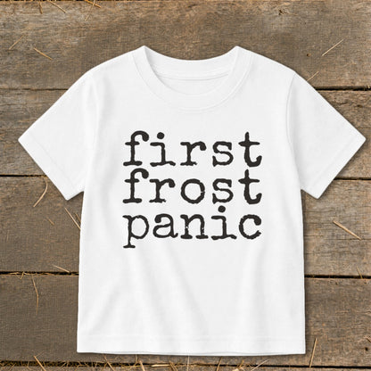 White t-shirt with black text "first frost panic"
