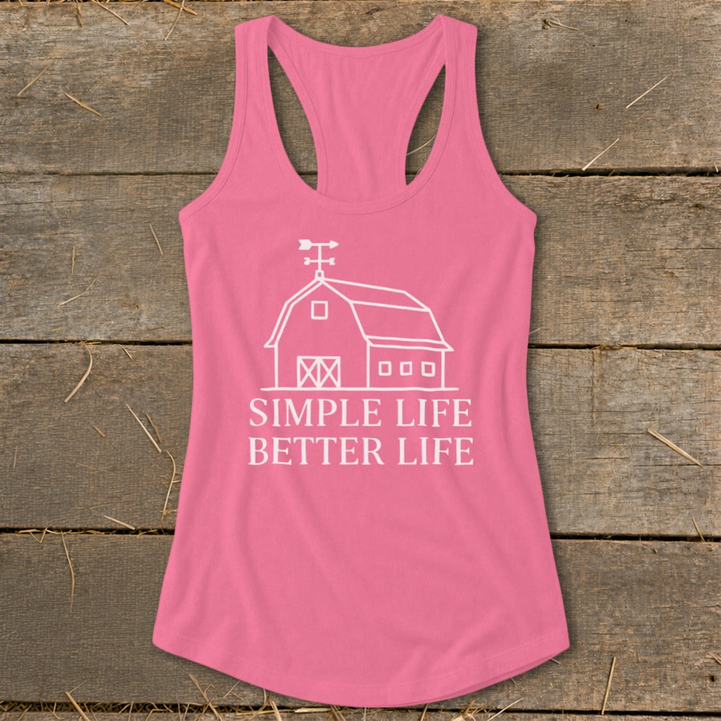Pink tank top with white barn graphic and text "SIMPLE LIFE BETTER LIFE".