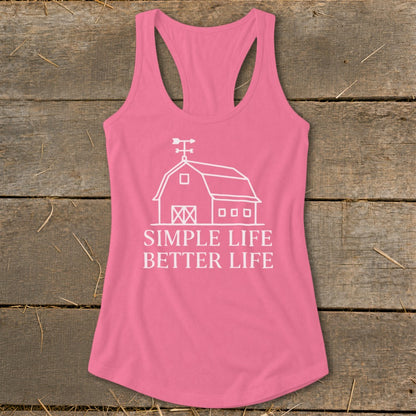 Pink tank top with white barn graphic and text "SIMPLE LIFE BETTER LIFE".