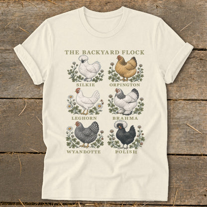 The Backyard Flock t-shirt features six chicken illustrations with their breed names: Silkie, Orpington, Leghorn, Brahma, Wyandotte, and Polish.