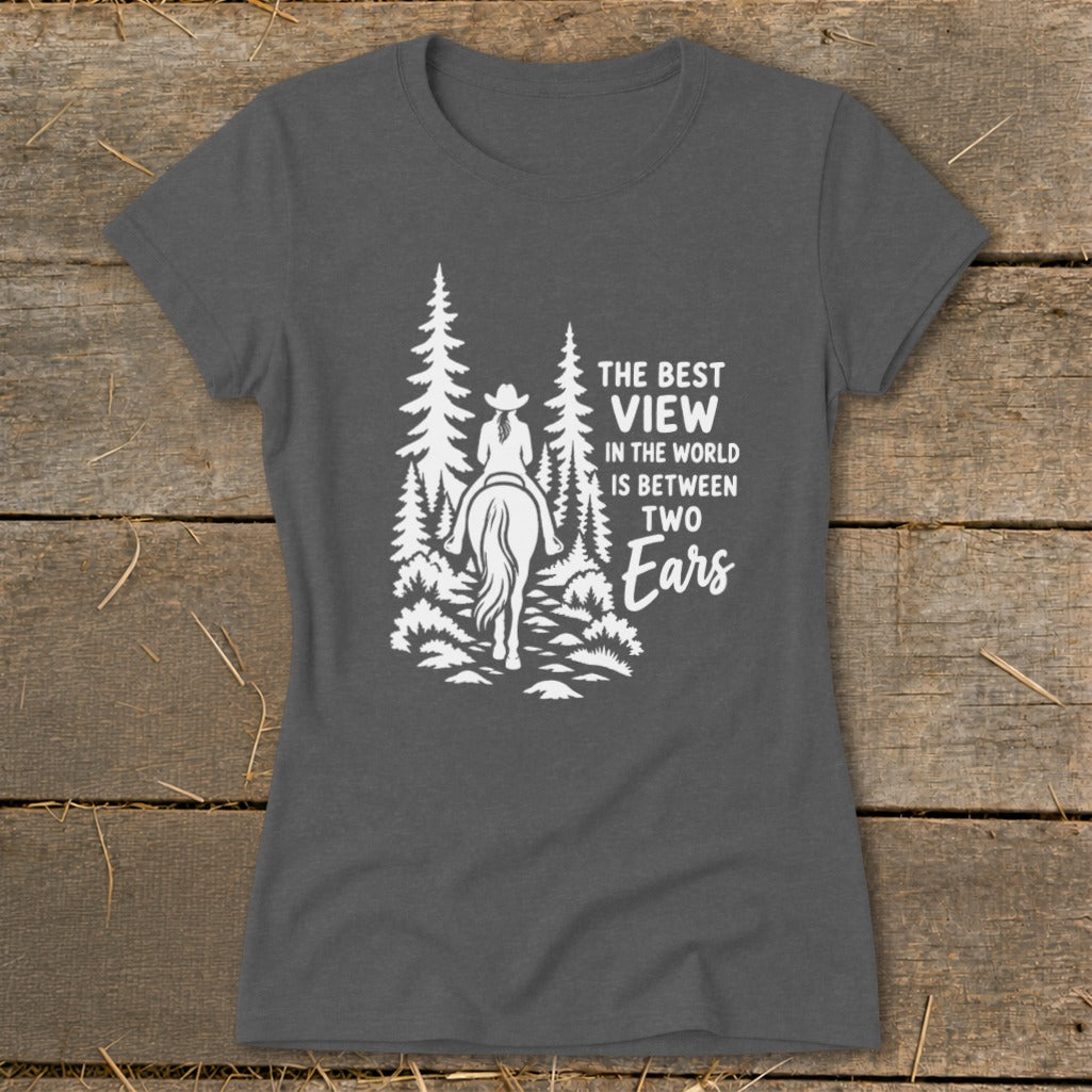 Dark gray short-sleeve t-shirt with a white graphic of a horse rider in the woods and text.