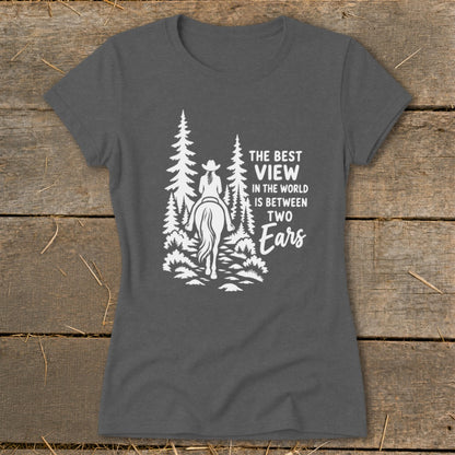 Dark gray short-sleeve t-shirt with a white graphic of a horse rider in the woods and text.