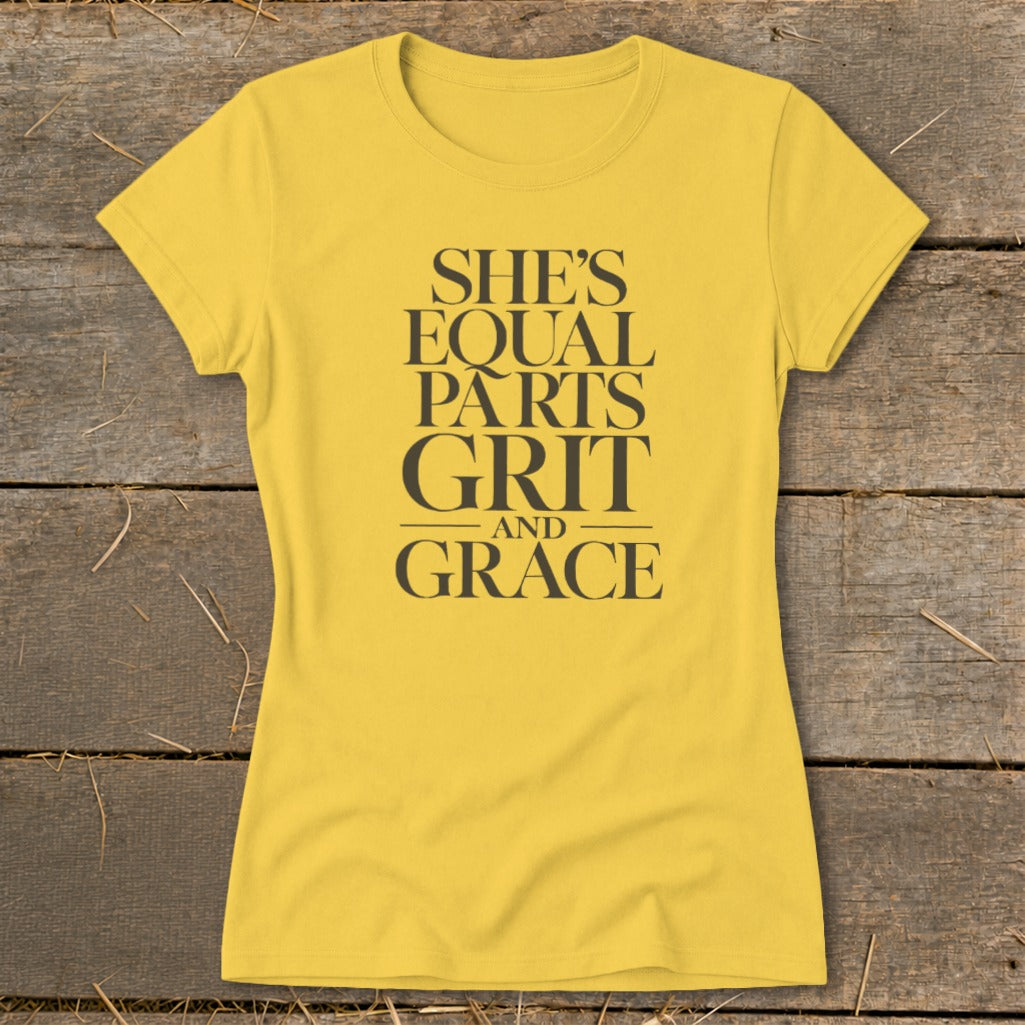 Yellow t-shirt with text "She's Equal Parts Grit and Grace."
