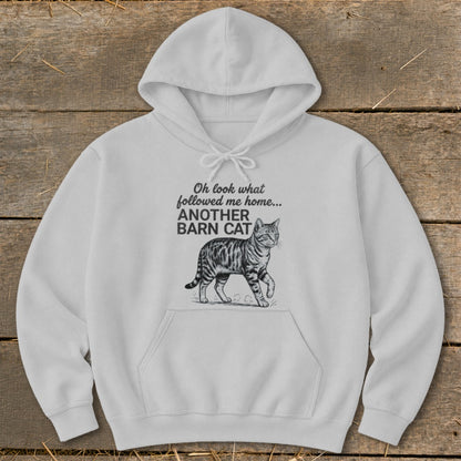 White hoodie with "Oh look what followed me home... ANOTHER BARN CAT" text and cat graphic.