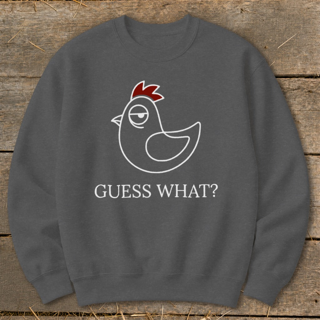 Dark gray sweatshirt with white line drawing of a chicken and text "GUESS WHAT?".