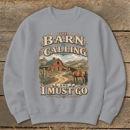 Crewneck sweatshirt with rustic barn, horse, and text "The Barn Is Calling And I Must Go."
