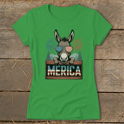 Donkey wearing sunglasses on "MERICA" sign with fireworks and trees.