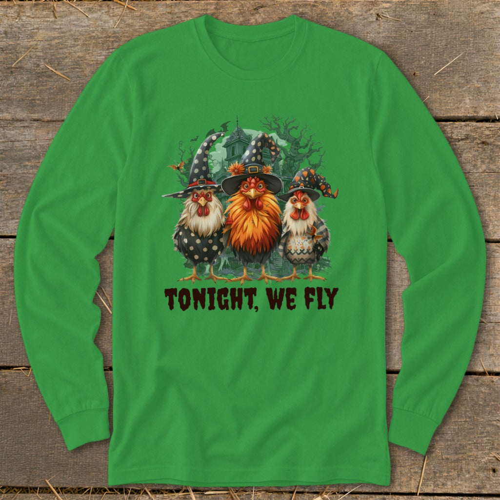 Three chickens in witch hats stand before a haunted house; text reads "TONIGHT, WE FLY".