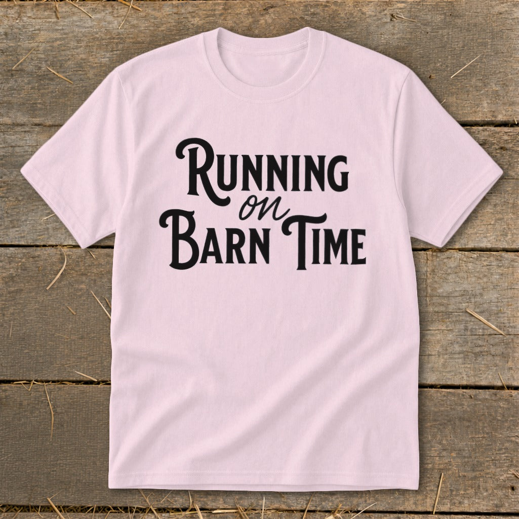 Pink t-shirt with black text "Running on Barn Time"
