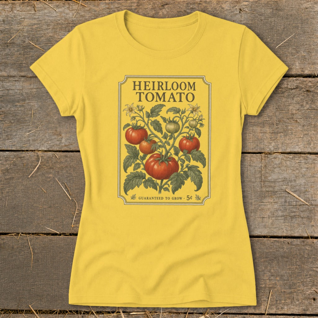 Yellow t-shirt with "Heirloom Tomato" seed packet design and tomatoes.
