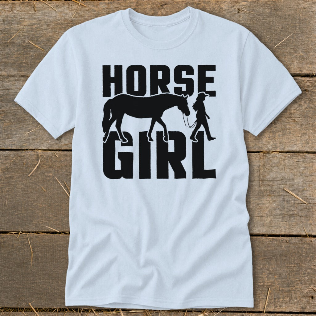 Light blue t-shirt with black graphic text "HORSE GIRL" and silhouette of horse and rider.
