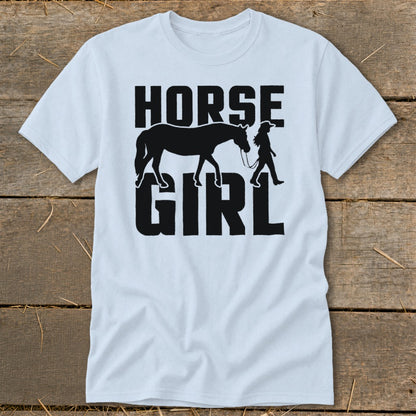 Light blue t-shirt with black graphic text "HORSE GIRL" and silhouette of horse and rider.