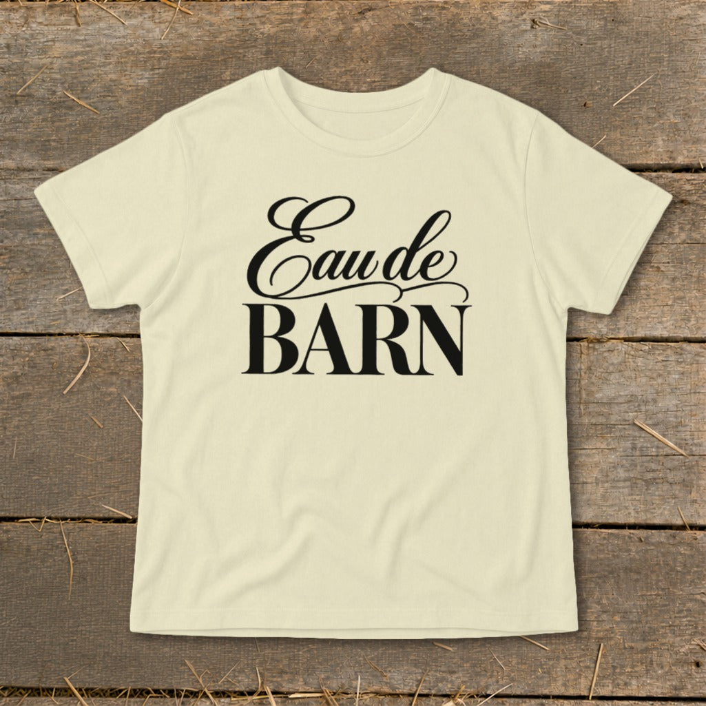 Cream t-shirt with black "Eau de BARN" text in script and block letters.