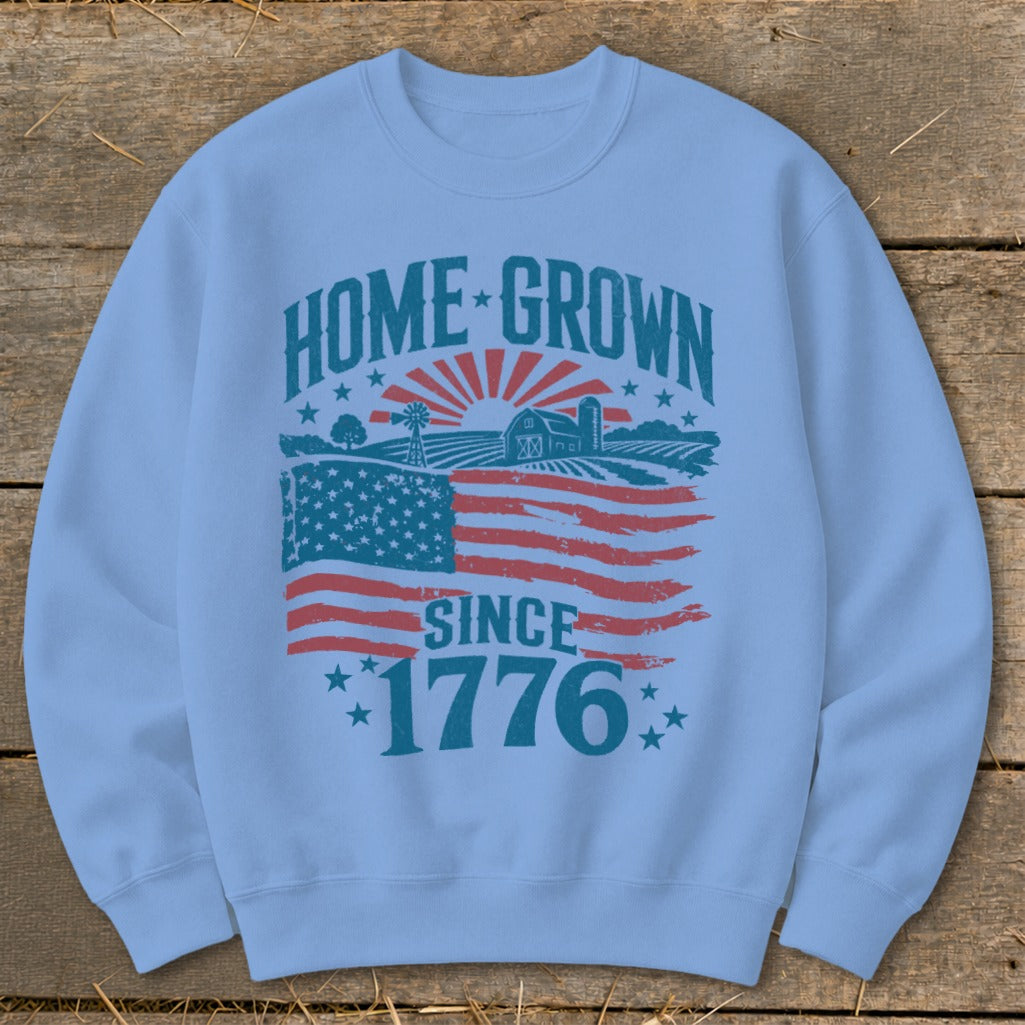 Light blue sweatshirt with "Home Grown Since 1776" and American flag graphic.