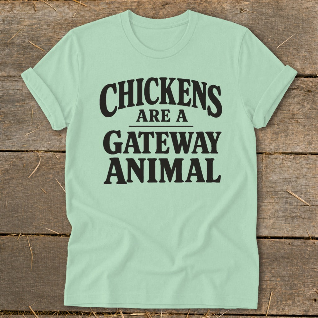 Light green t-shirt with black text that reads "CHICKENS ARE A GATEWAY ANIMAL".
