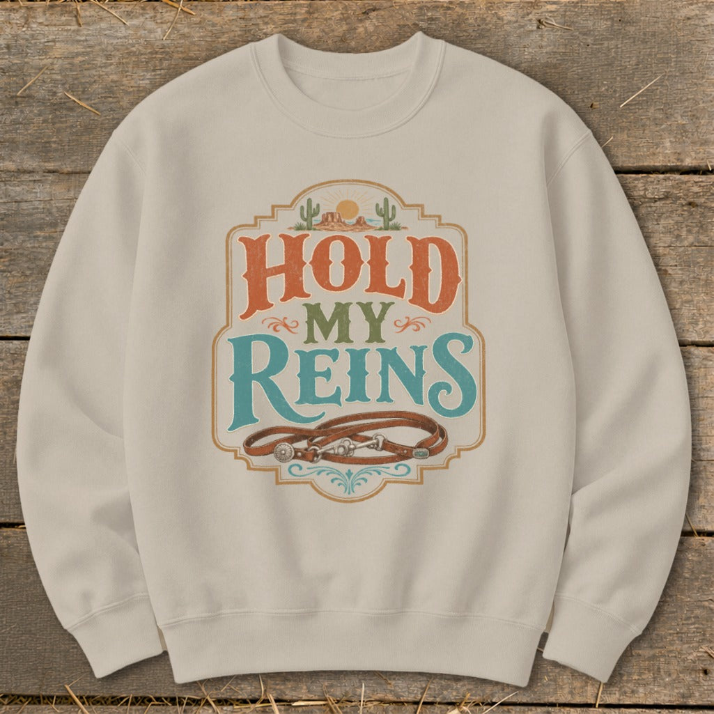 Crewneck sweatshirt with "Hold My Reins" graphic and western-style reins.