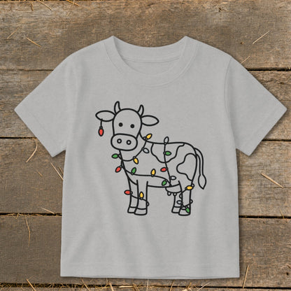 Grey t-shirt with a black outline of a cow wrapped in colorful Christmas lights.