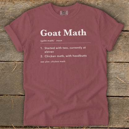 Maroon t-shirt with "Goat Math" definition printed in white text.