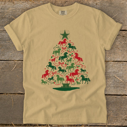 Tan t-shirt with a Christmas tree design made of red and green horses.