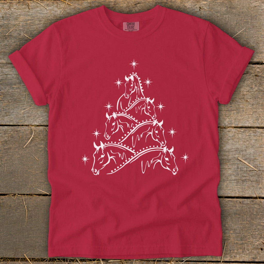 Red t-shirt with white horse Christmas tree graphic and stars.