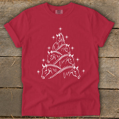 Red t-shirt with white horse Christmas tree graphic and stars.