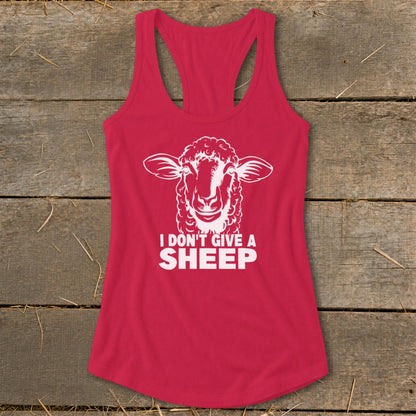 Pink tank top with white sheep graphic and "I DON'T GIVE A SHEEP" text.