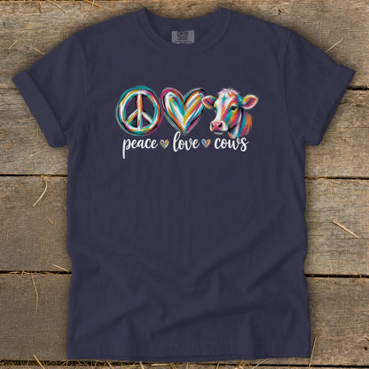 Navy t-shirt with peace sign, heart, and colorful cow graphic.