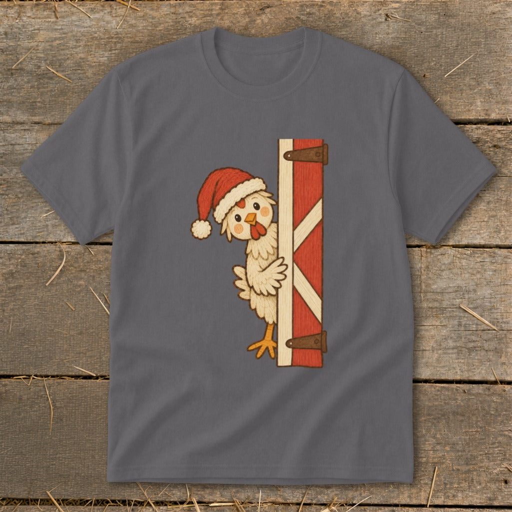 Cartoon chicken wearing a Santa hat peeks from behind a red barn door.