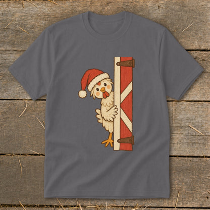 Cartoon chicken wearing a Santa hat peeks from behind a red barn door.