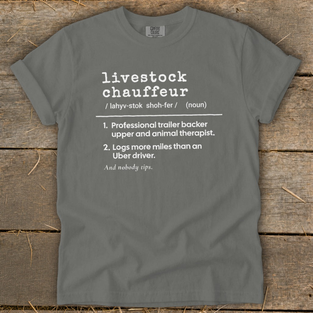 Grey t-shirt with white text defining "livestock chauffeur" with humorous descriptions.