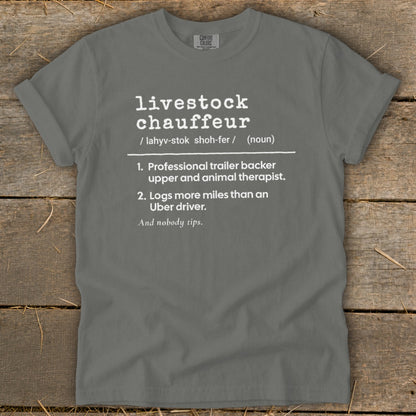 Grey t-shirt with white text defining "livestock chauffeur" with humorous descriptions.